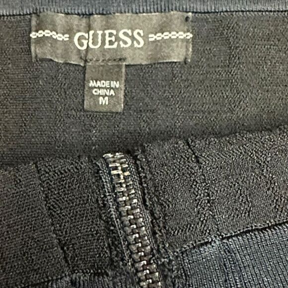 GUESS Women’s Jet Black Multi Logo Mirage Garter Mini Skirt Size Medium NWT - Picture 4 of 7